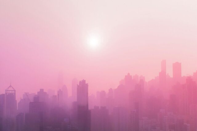 skyscraper covered with fog at daytime