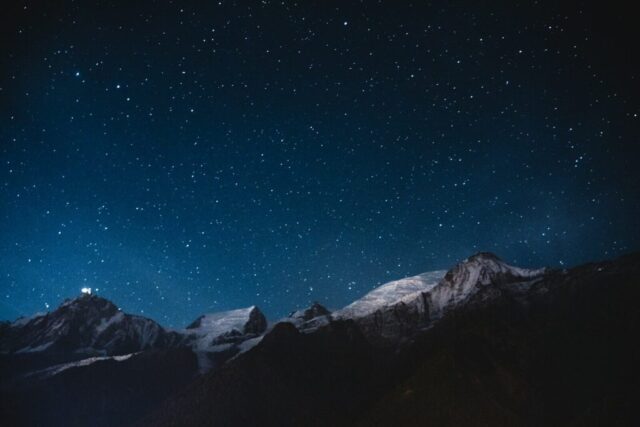 snow mountains under nightsky snow mountains under nightsky