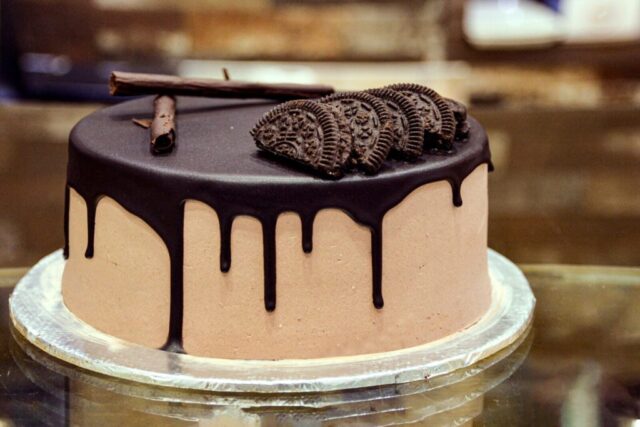 Photo by Cocodillaa.com chocolate cake with chocolate syrup on top