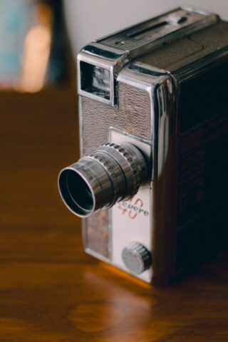 Close-up of a vintage revere movie camera.