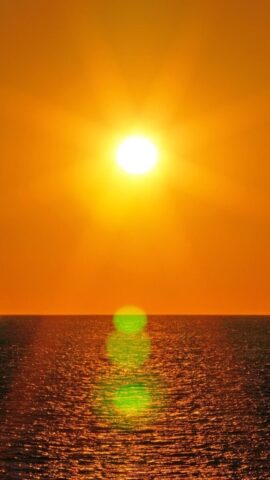 sun setting over the sea