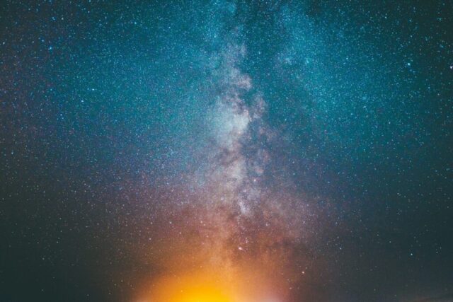 blue, yellow, and purple starry sky during nighttime blue, yellow, and purple starry sky during nighttime