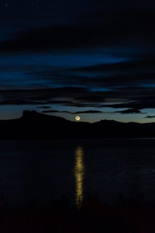silhouette of mountains during nighttime silhouette of mountains during nighttime