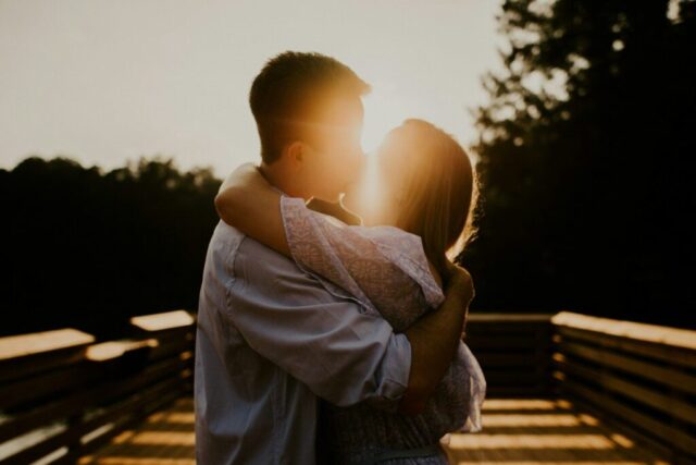 Photo by Cocodillaa.com man and woman kissing during sunset