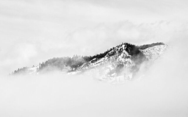 fog covered snow covered mountain