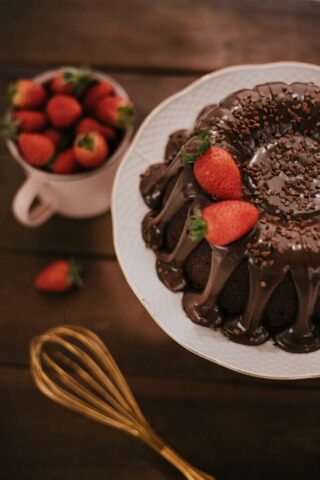 Photo by Cocodillaa.com chocolate cake with strawberry on white ceramic plate