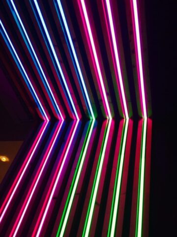 turned on green, purple, and blue neon lights