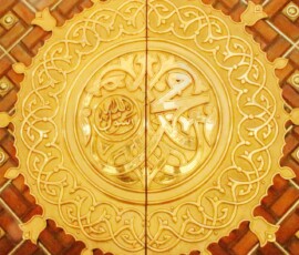 a golden door with a decorative design on it