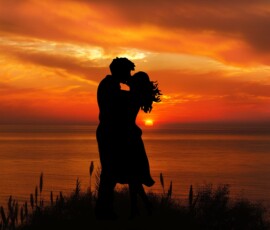 couple romantic kiss silhouette sunset seascape together