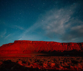 Long Exposure Starry Sky over the Red Sandstone Cliffs of Moab, Utah Long Exposure Starry Sky over the Red Sandstone Cliffs of Moab, Utah